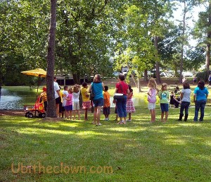 Children waiting in line for a balloon at Arts in Wayne park, during Sunday in the Garden.