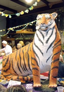 The paper mache tigers appeared courtesy of the Carolina Tiger Rescue organization, which isn't far from the where the party was held.