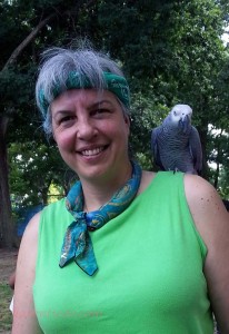 Karen with Calliope, an African Gray parrot who spent the day at the park.