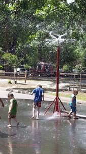 The Goldsboro fire department opened a hydrant and set up a power sprinkler so children could play in the water.