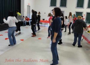 Electric Slide/Line dancing at the inaugural Valentine's Day Extravaganza for Special Needs Children of Wayne County, NC.
